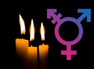 Glowing candles beside a transgender symbol.