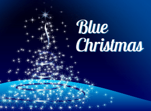 Glowing lights form the shape of a Christmas tree over a blue background. To the right, text reads: “Blue Christmas”.